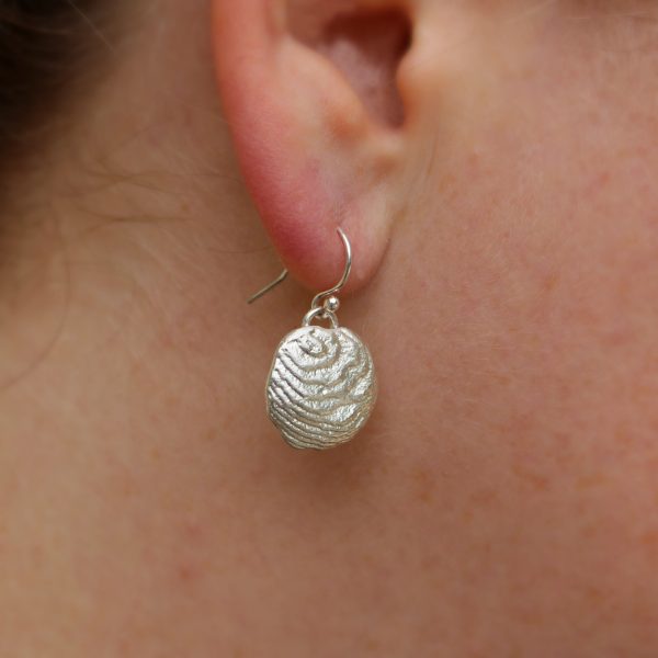 Blinkidees One-of-a-kind carved sterling silver earrings